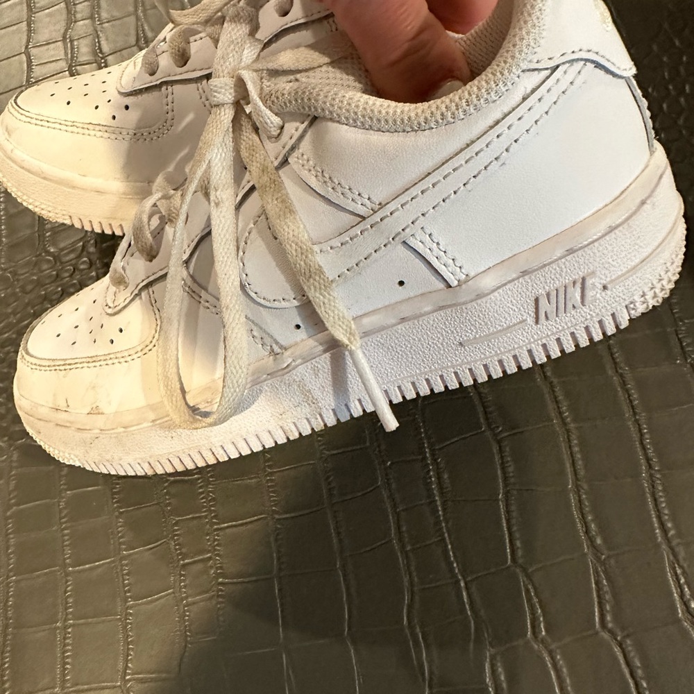 Kids unisex white Nike Air Force one sneakers! Size 12. Worn a few times only.